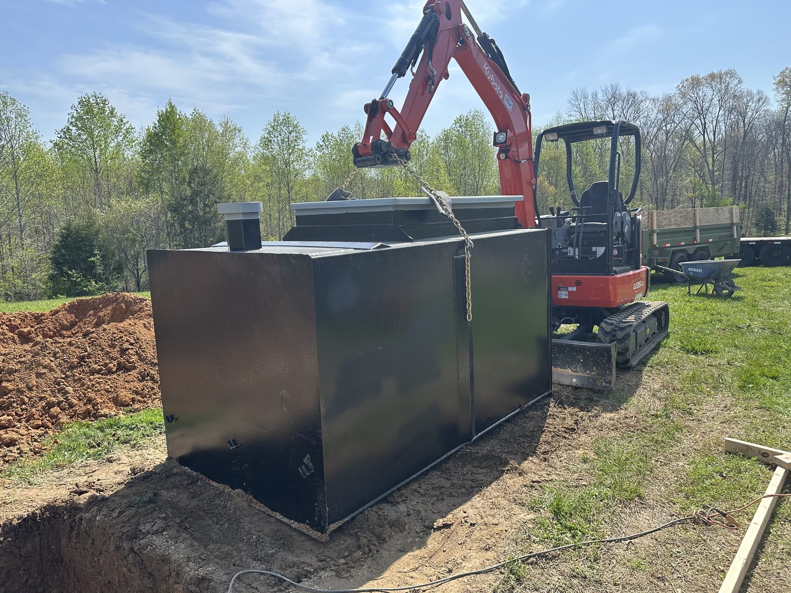 Outdoor tornado shelter being professionally installed in Tennessee